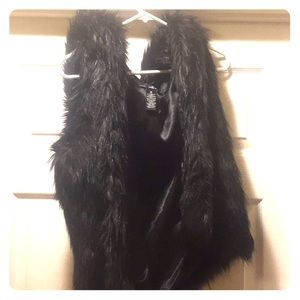 Black hooded fur vest